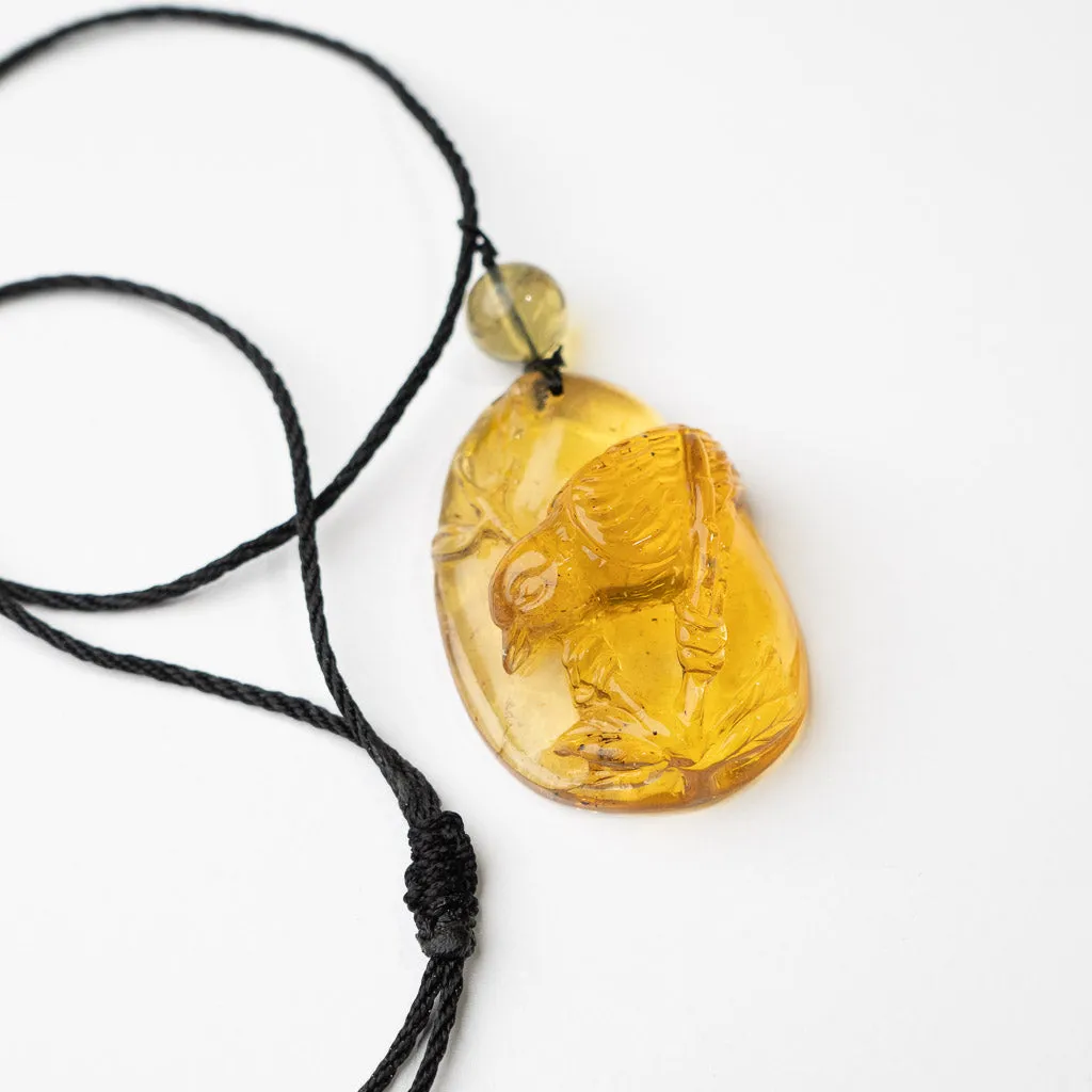 Dominican Blue Amber Pendant, Bird Carved