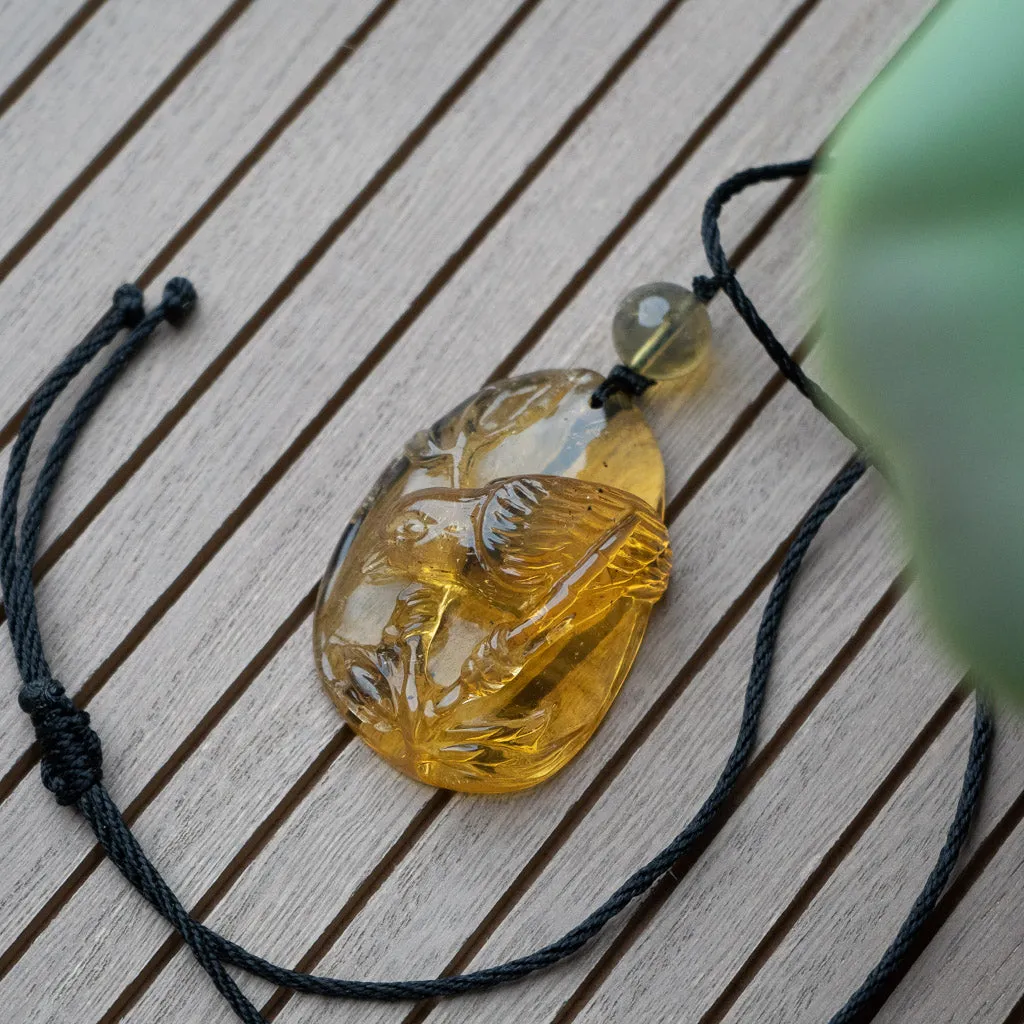 Dominican Blue Amber Pendant, Bird Carved