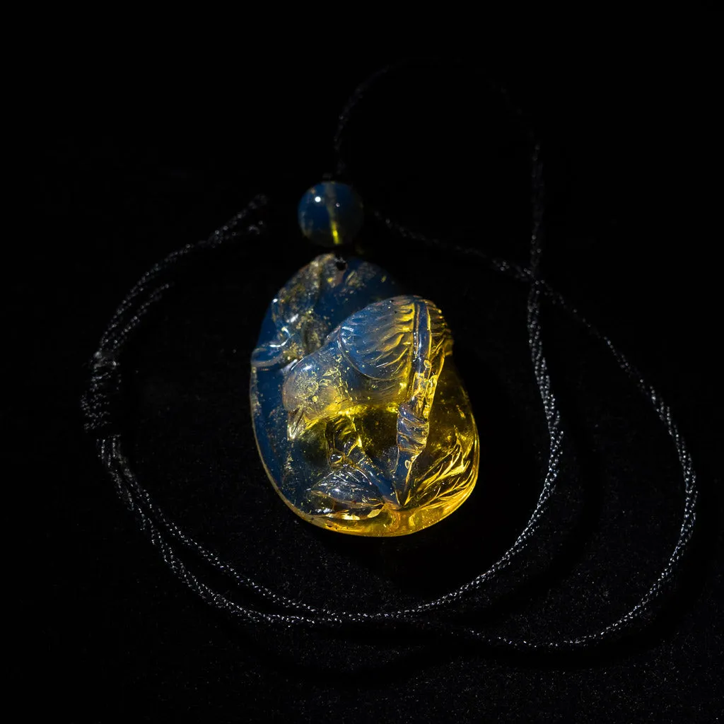 Dominican Blue Amber Pendant, Bird Carved