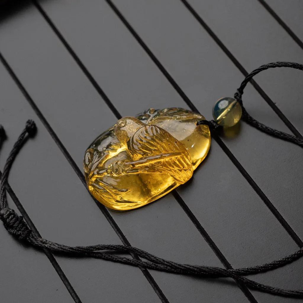 Dominican Blue Amber Pendant, Bird Carved
