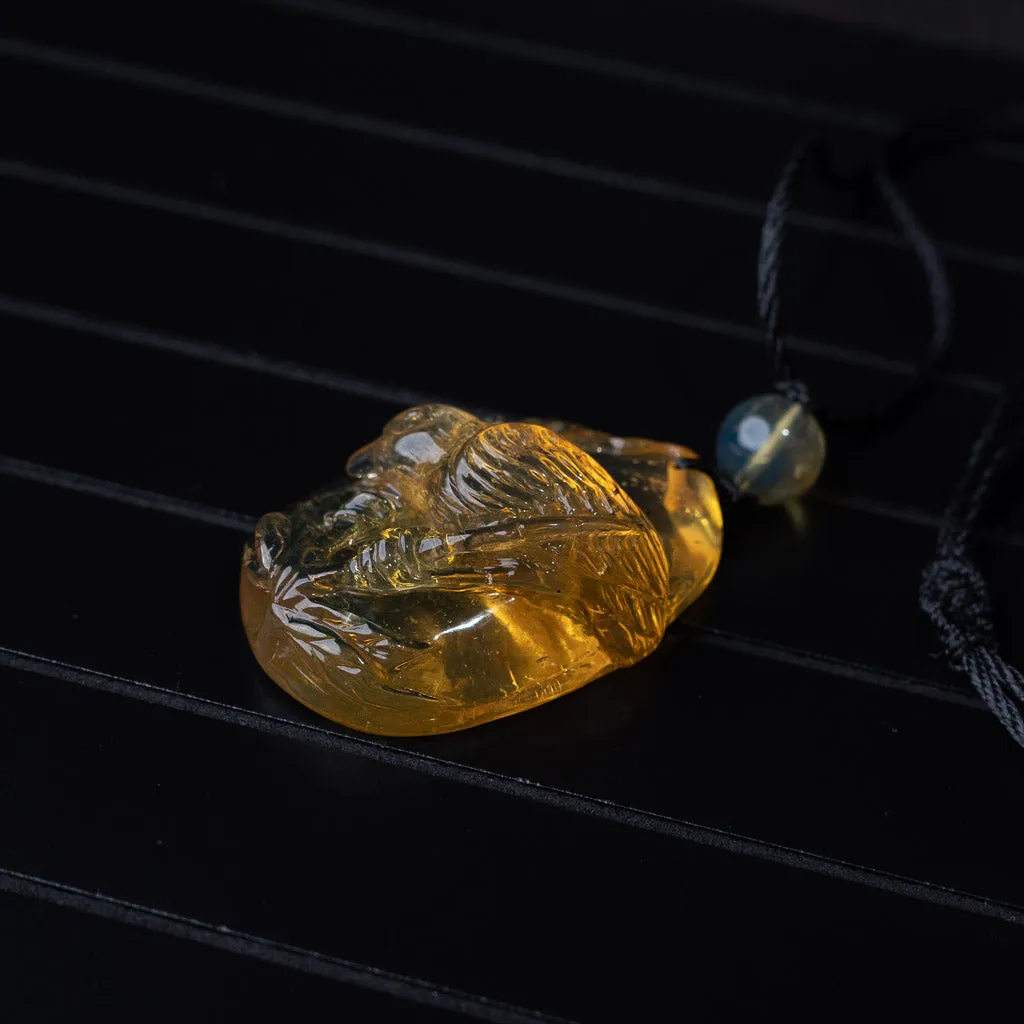 Dominican Blue Amber Pendant, Bird Carved