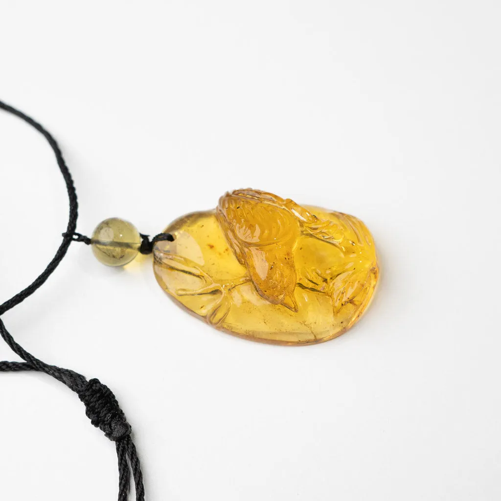 Dominican Blue Amber Pendant, Bird Carved