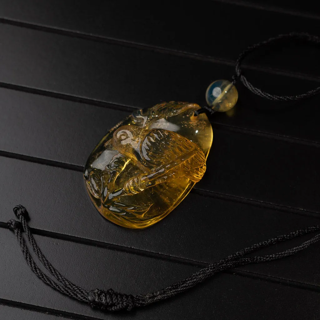 Dominican Blue Amber Pendant, Bird Carved