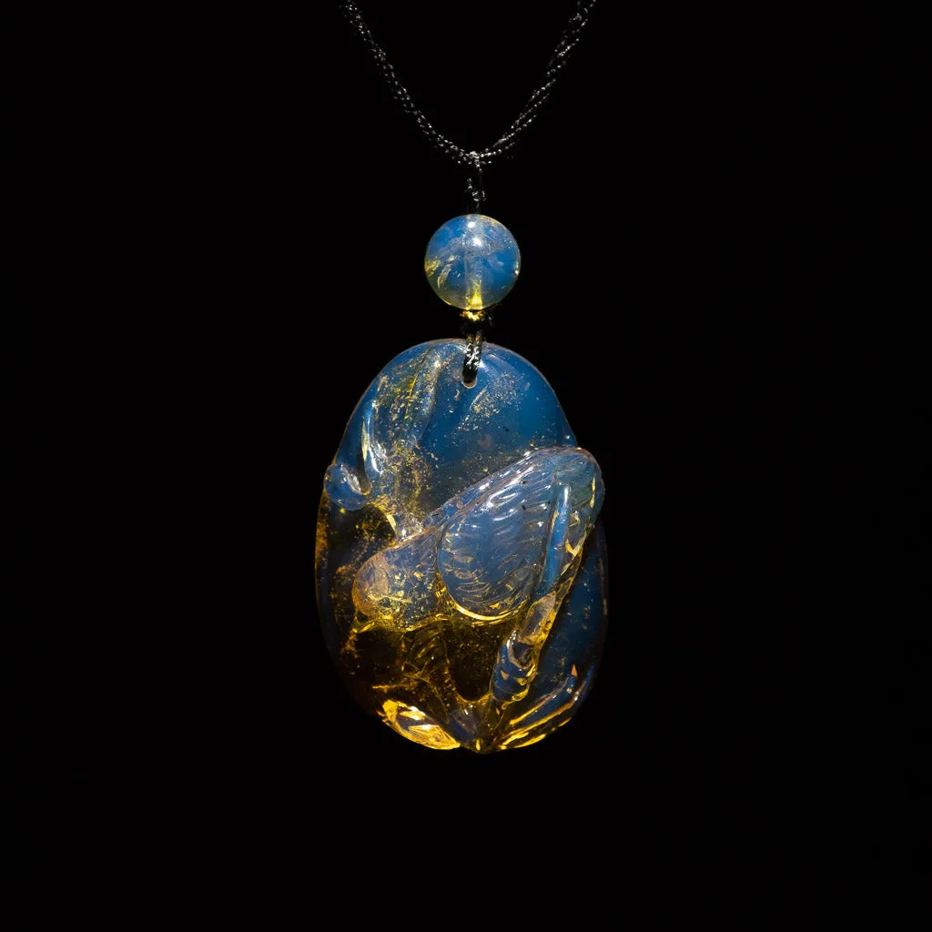 Dominican Blue Amber Pendant, Bird Carved