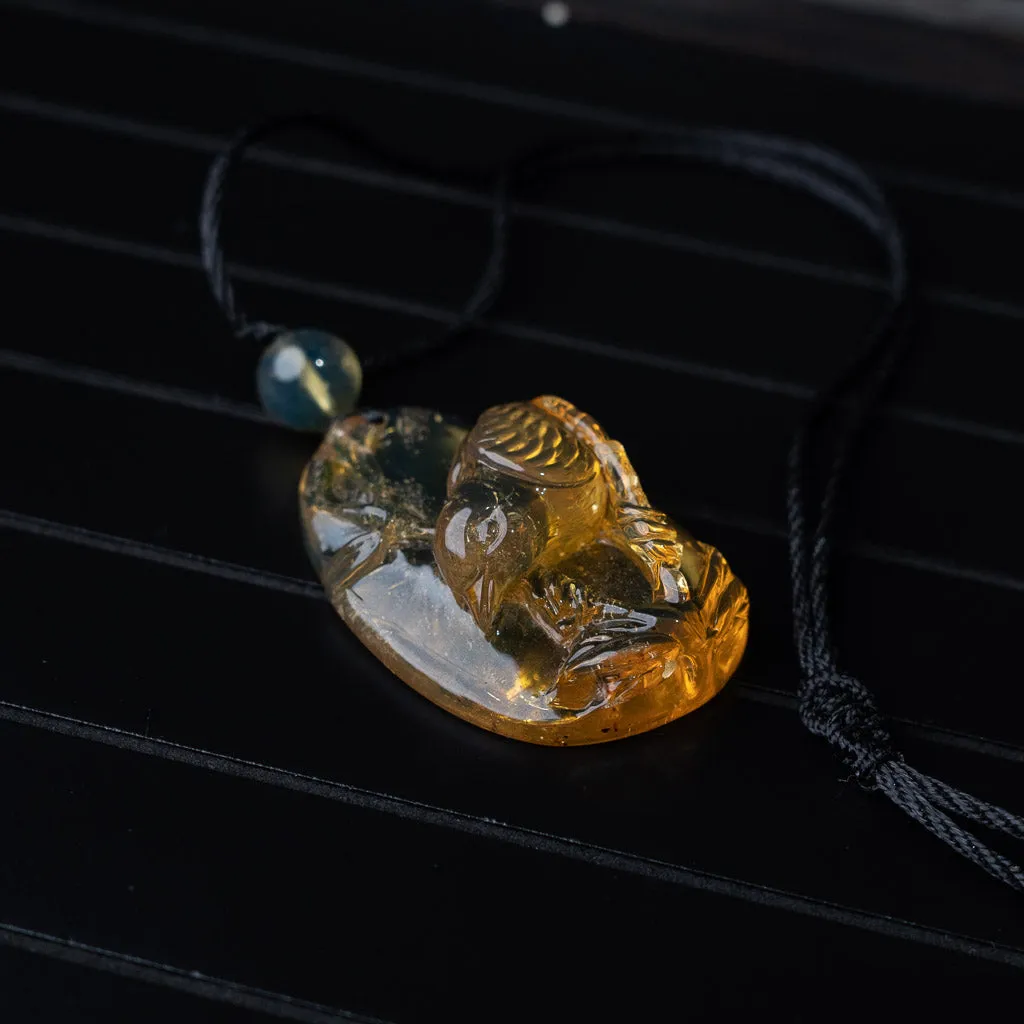 Dominican Blue Amber Pendant, Bird Carved