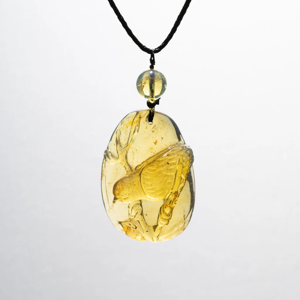 Dominican Blue Amber Pendant, Bird Carved