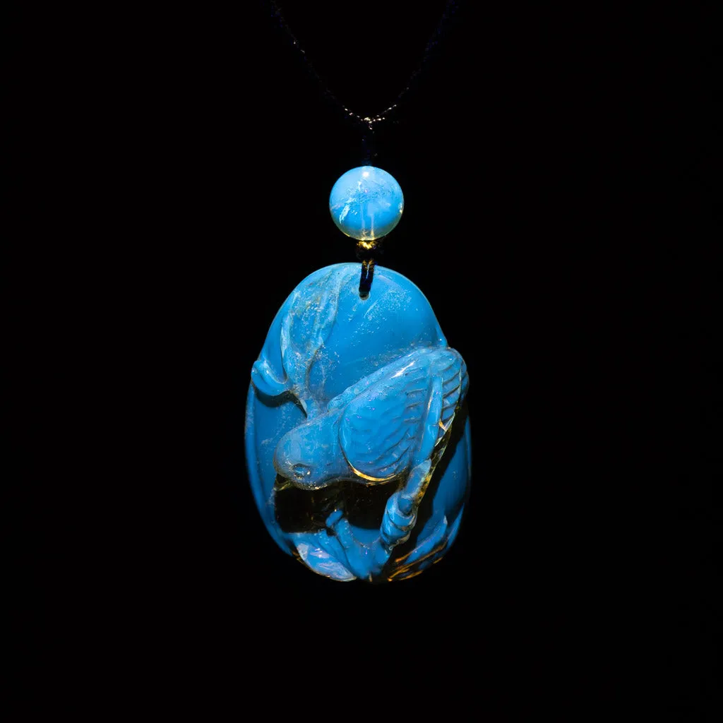 Dominican Blue Amber Pendant, Bird Carved
