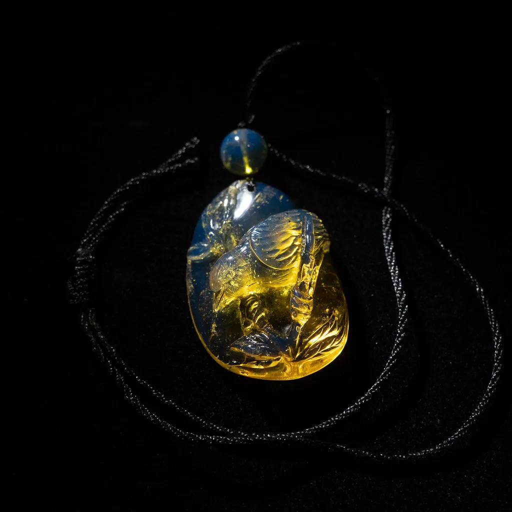 Dominican Blue Amber Pendant, Bird Carved