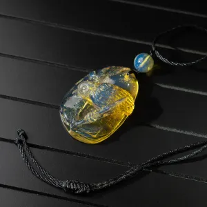 Dominican Blue Amber Pendant, Bird Carved