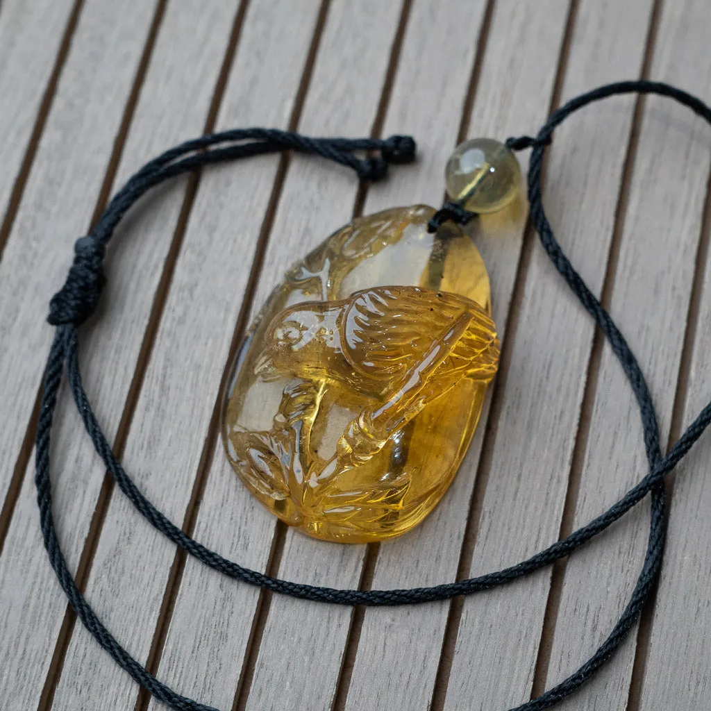 Dominican Blue Amber Pendant, Bird Carved
