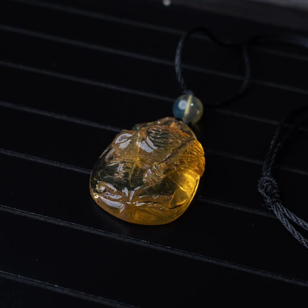 Dominican Blue Amber Pendant, Bird Carved