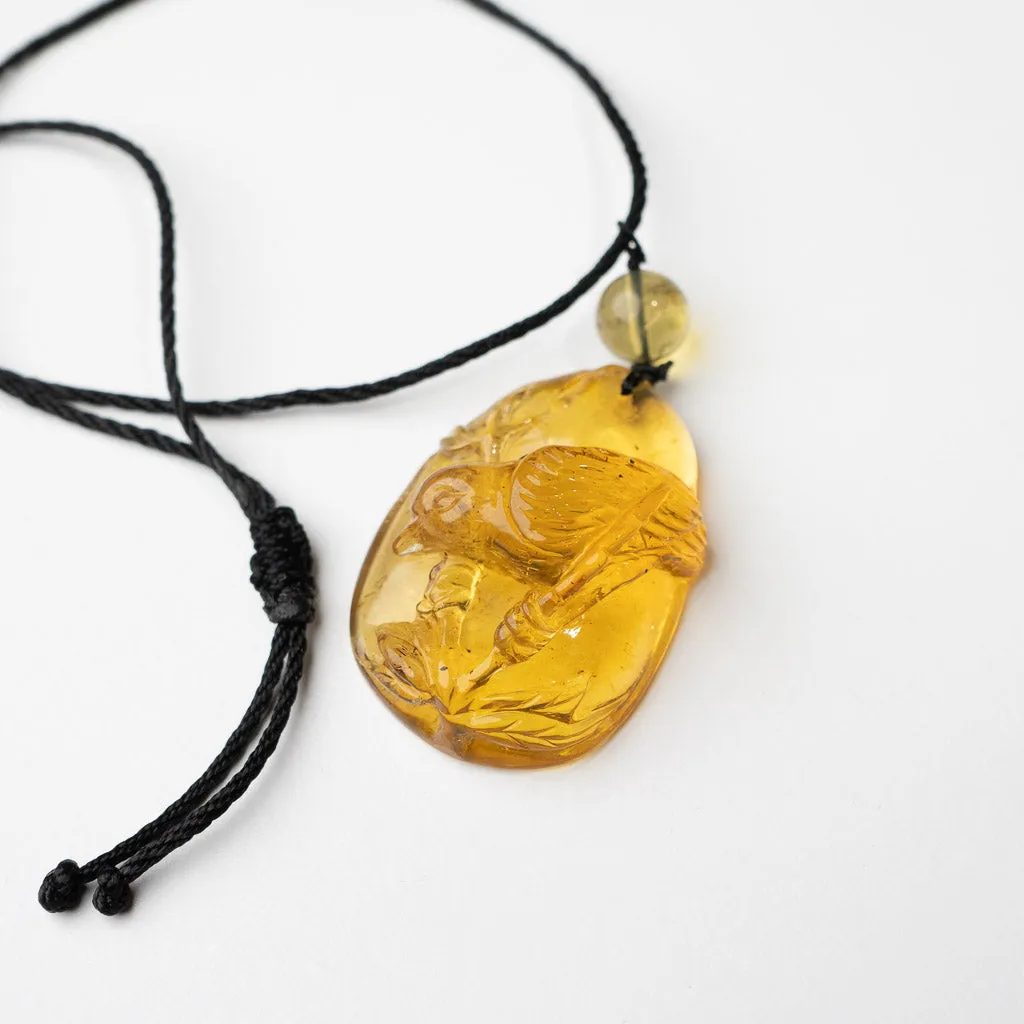 Dominican Blue Amber Pendant, Bird Carved