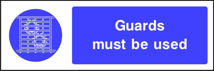 Guards Must be Used safety sign