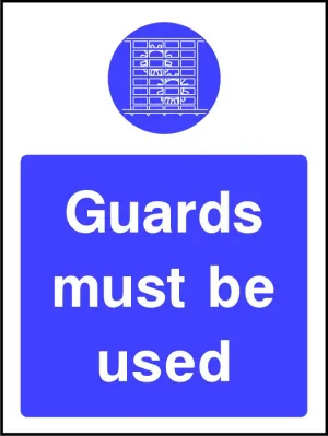 Guards Must be Used safety sign