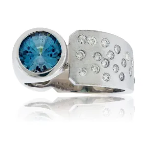Round Blue Zircon, Diamond Flush Set, Barrel Style Ring