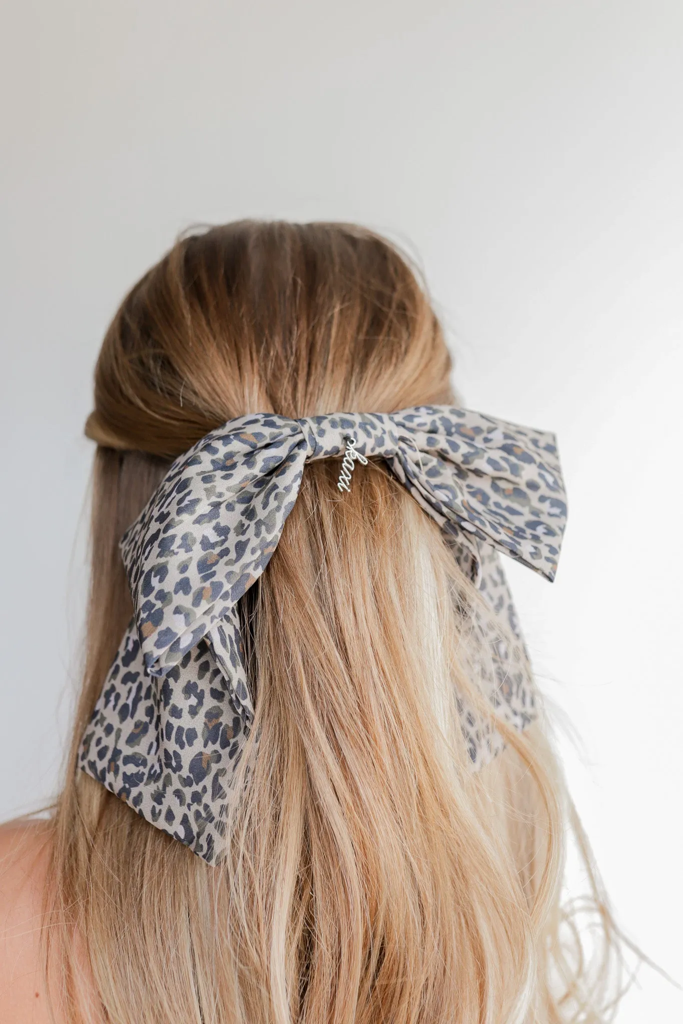 SLOUCHY CHEETAH BOW