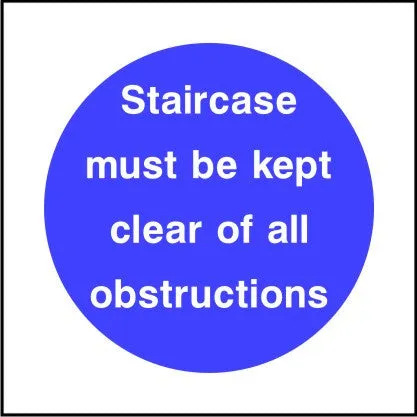 Staircase must be kept clear of all obstructions sign