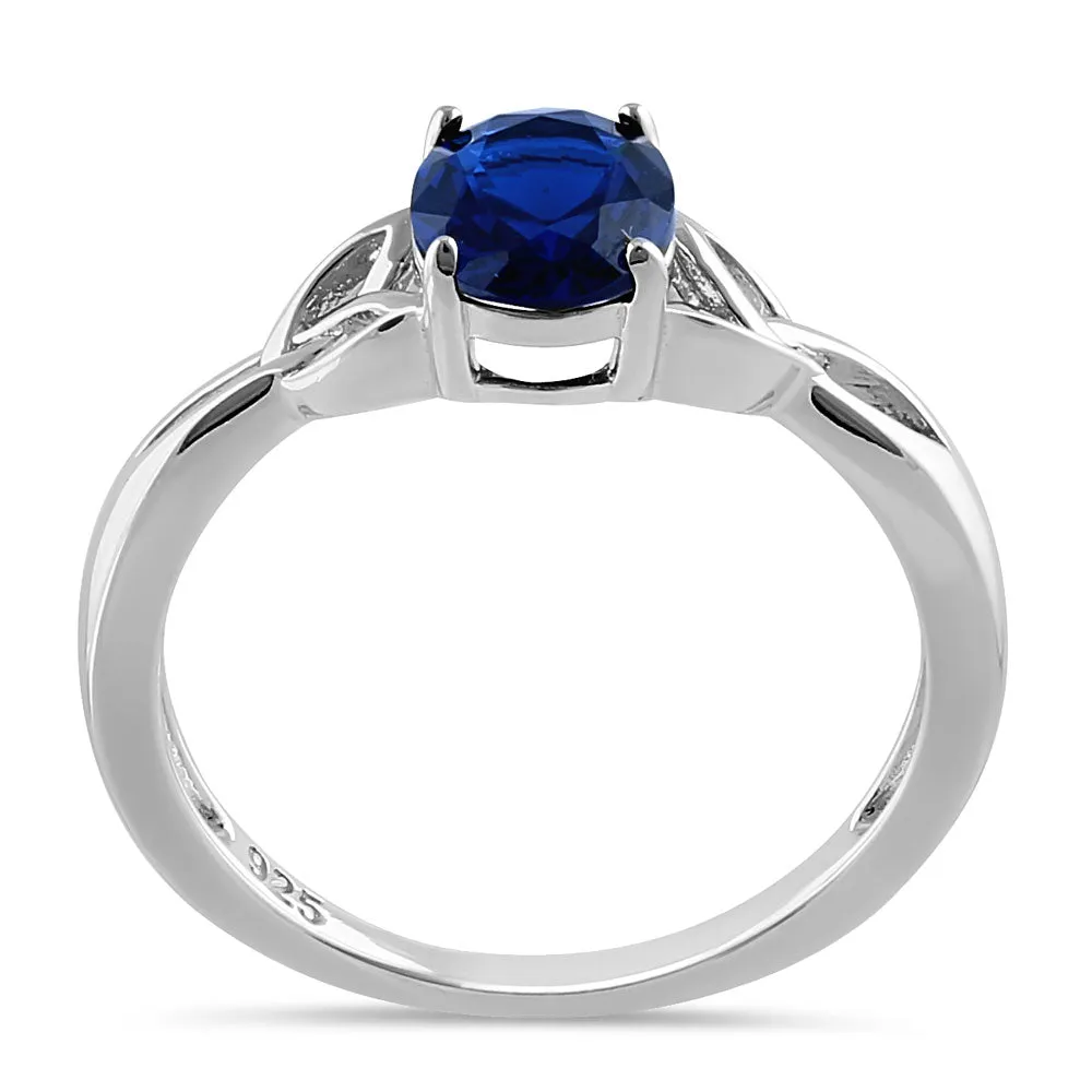 Sterling Silver Charmed Oval Blue CZ Ring