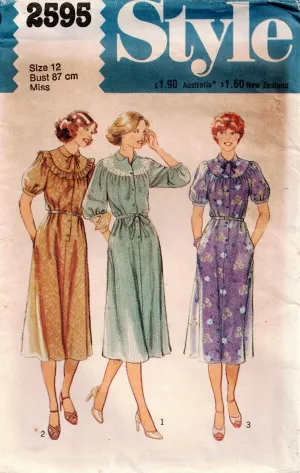 Style 2595 Womens Puffy Sleeved Round Yoked Dress with Pockets 1970s Vintage Sewing Pattern Size 12 Bust 34 inches UNCUT Factory Folded