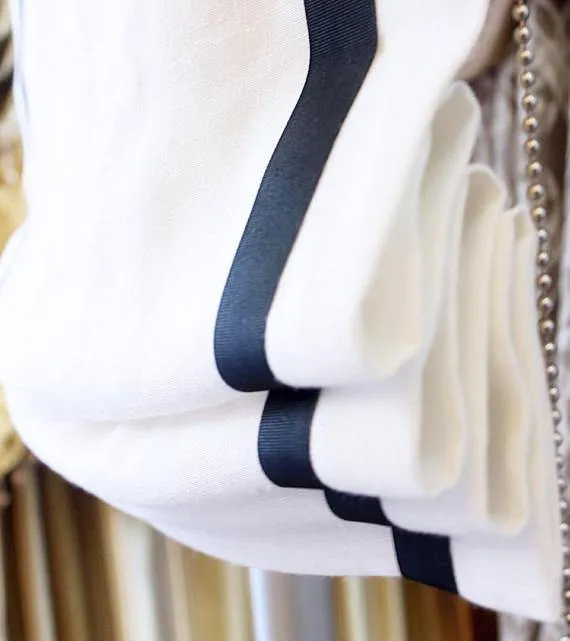 White Linen Relaxed Roman Shade with Black Ribbon Band